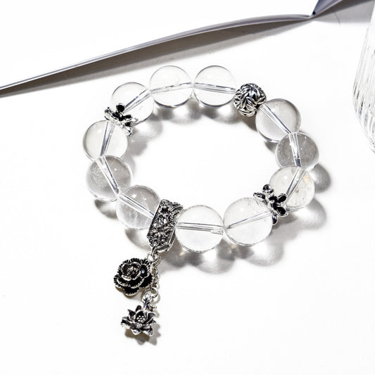 Clarity Bloom · Clear Quartz Bracelet with Silver Rose Charm
