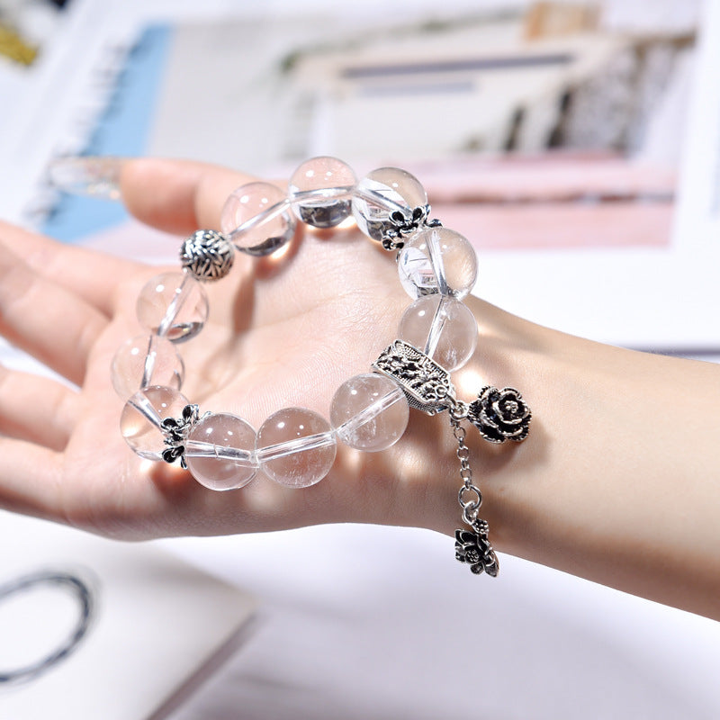 Clarity Bloom · Clear Quartz Bracelet with Silver Rose Charm