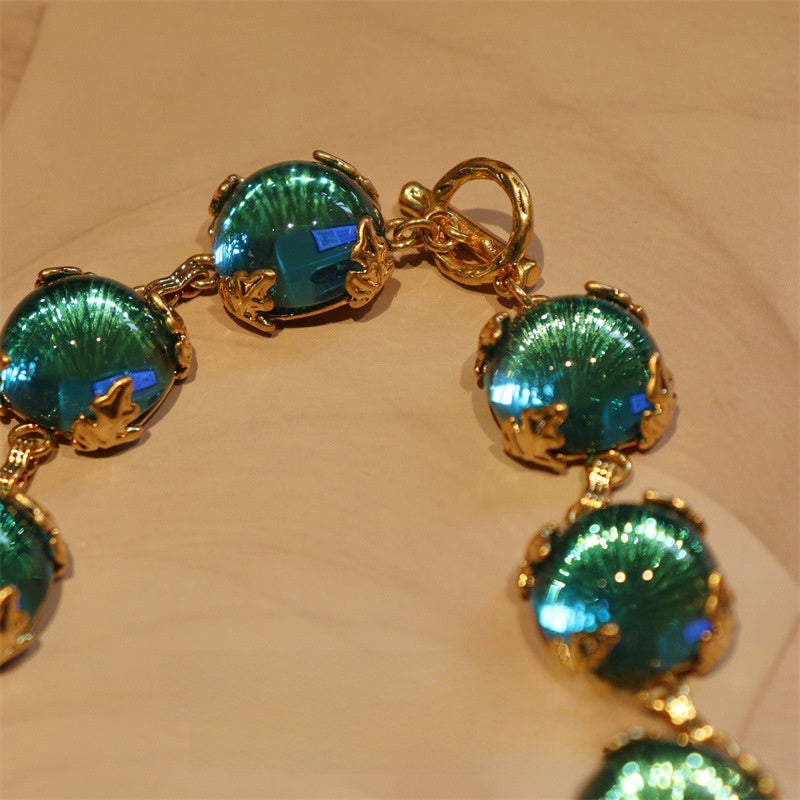 Lagunenlicht · Vintage-Halskette mit Teal-Glascabochon