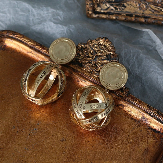 Orbit Muse · Vintage Gold Sphere Clip-On Earrings