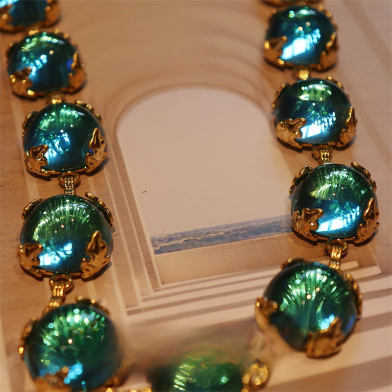 Lagunenlicht · Vintage-Halskette mit Teal-Glascabochon