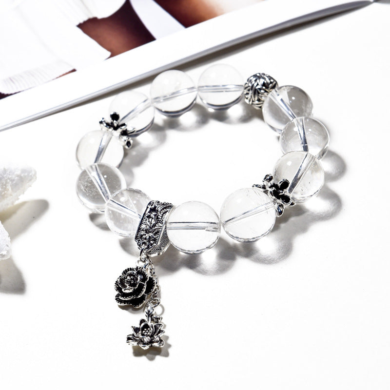 Clarity Bloom · Clear Quartz Bracelet with Silver Rose Charm