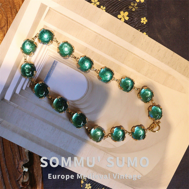 Lagunenlicht · Vintage-Halskette mit Teal-Glascabochon
