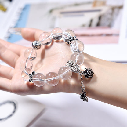 Clarity Bloom · Clear Quartz Bracelet with Silver Rose Charm