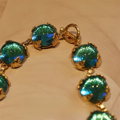 Lagunenlicht · Vintage-Halskette mit Teal-Glascabochon