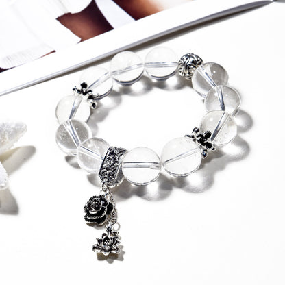 Clarity Bloom · Clear Quartz Bracelet with Silver Rose Charm