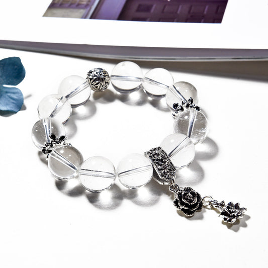 Clarity Bloom · Clear Quartz Bracelet with Silver Rose Charm