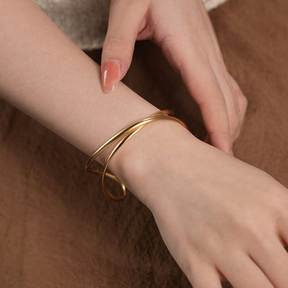 Golden Crossflow · Adjustable Open Bangle Bracelet