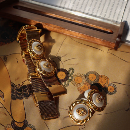 Golden Eye · Vintage Armband- und Ohrring-Set mit geflochtenem Rand